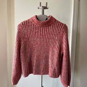 Soft knit sweater.
